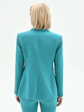 Giacca studio asimmetrica drappeggiata verde smeraldo