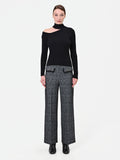 Maglia nera a coste con cut out in misto viscosa