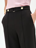 Pantalone nero a gamba dritta con bottoni gioiello