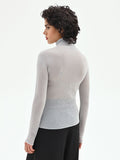 Maglia argento con texture a nido d'ape