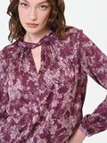 Blusa rosso bordeaux con fantasia e collo a torchon