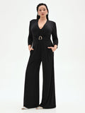 Tuta nera Curvy palazzo in jersey fluido