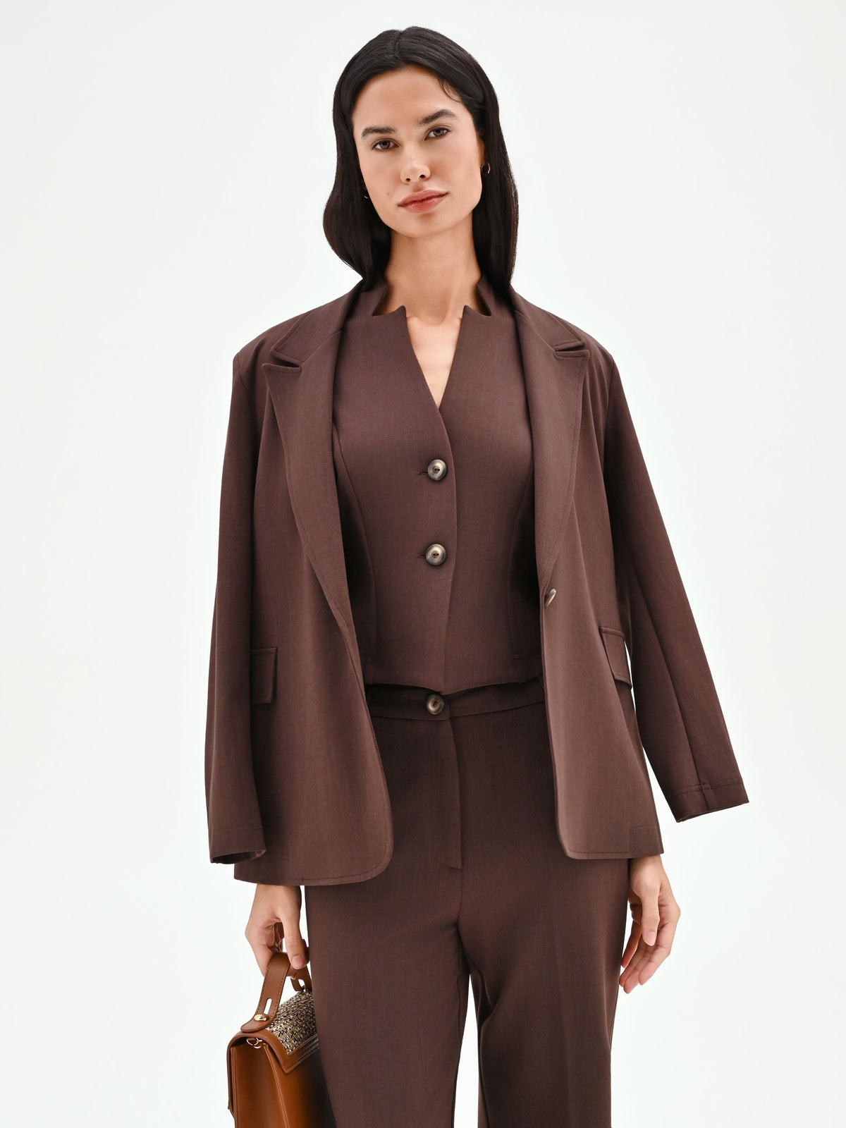 Gilet cioccolato con revers a punta