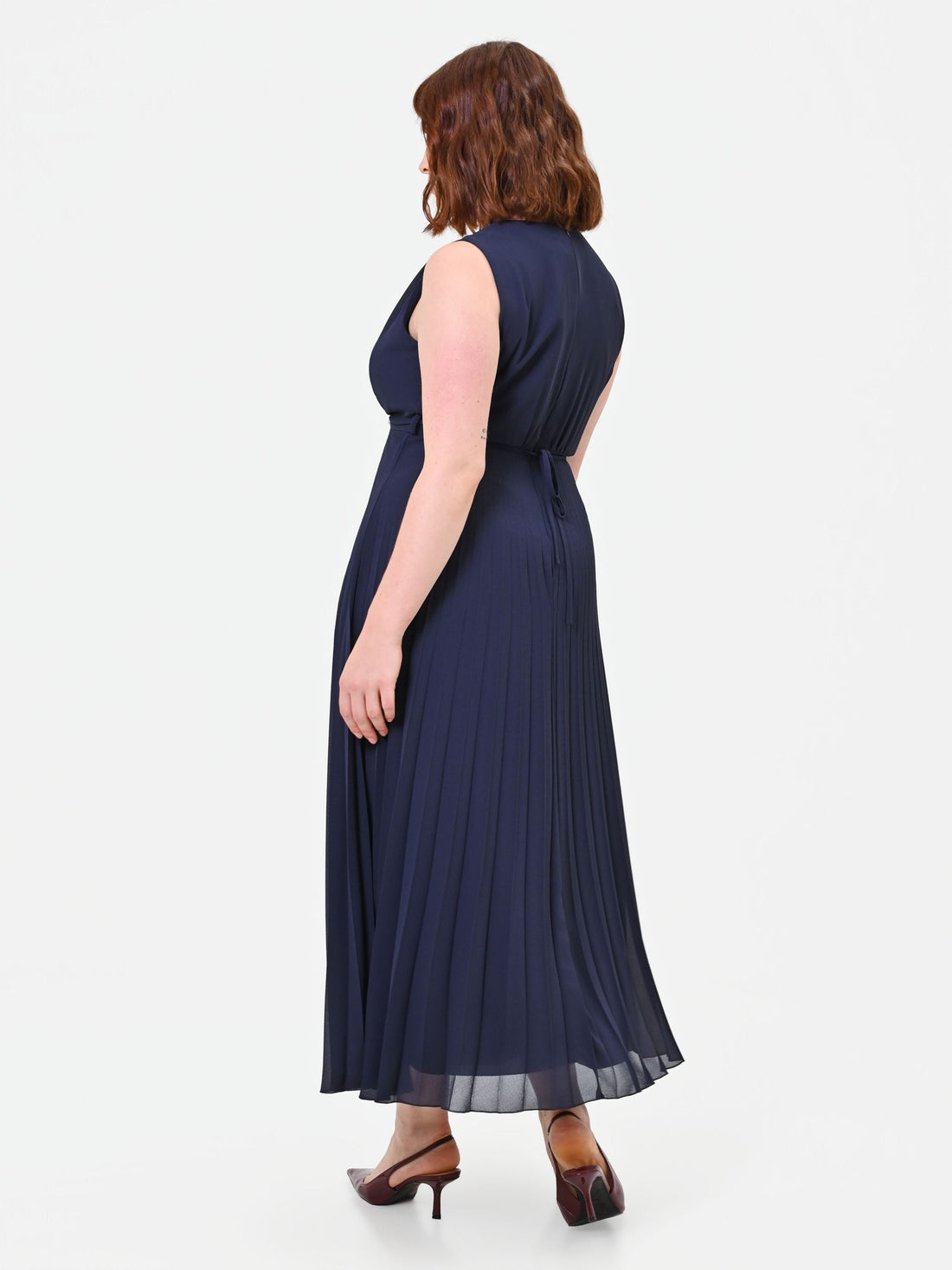 Abito Curvy plissé blu navy con scollo incrociato