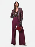 Pantalone palazzo bordeaux con bottone piatto in cadi