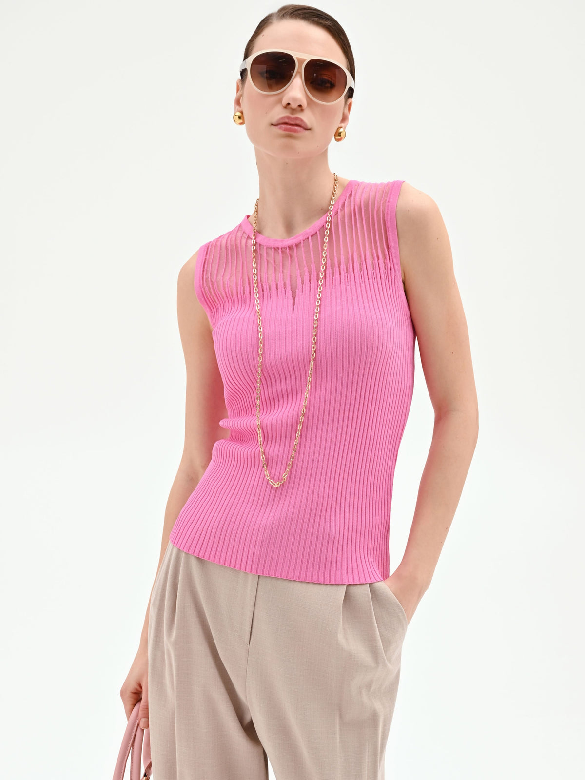 Top rosa in maglia a costine con inserto a righe