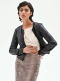Giacca similpelle nera con zip e arricciature