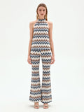 Top azzurro con mtotivo chevron e scollo all'americana