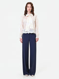 Blusa in pizzo panna con fiocco al collo