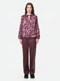 Blusa rosso bordeaux con fantasia e collo a torchon