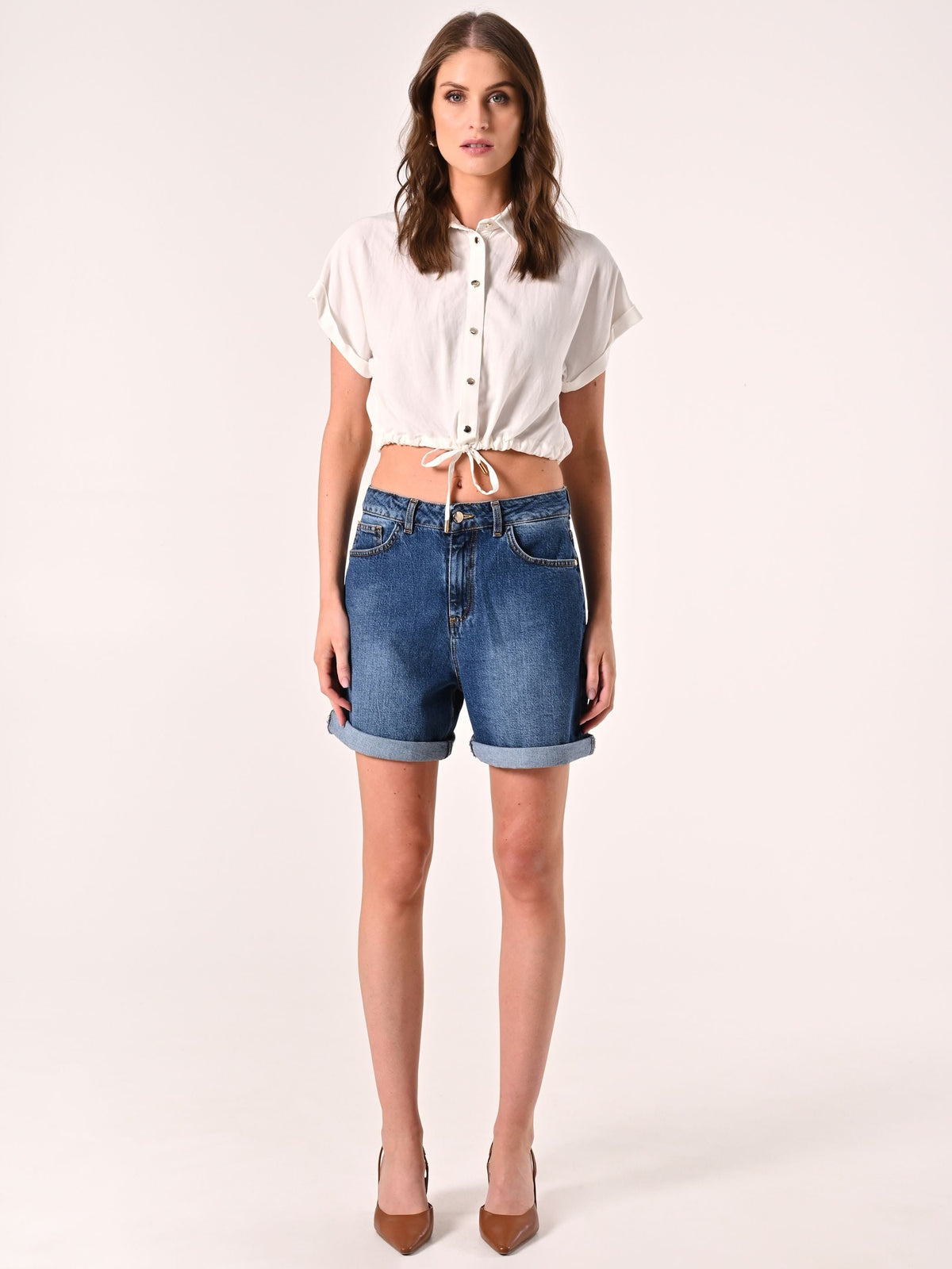 Shorts in Denim dal Lavggio Uniforme