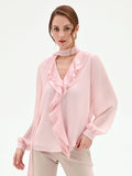 Blusa rosa chiaro con rouche e nastro lavalliere