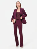 Pantalone svasato bordeaux in tessuto tecnico con fascione in vita