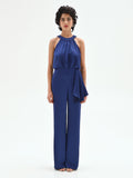 Tuta elegante blu brillante con drappeggio laterale