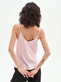 Top in raso rosa pastello con scollo a v