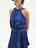 Tuta elegante blu brillante con drappeggio laterale