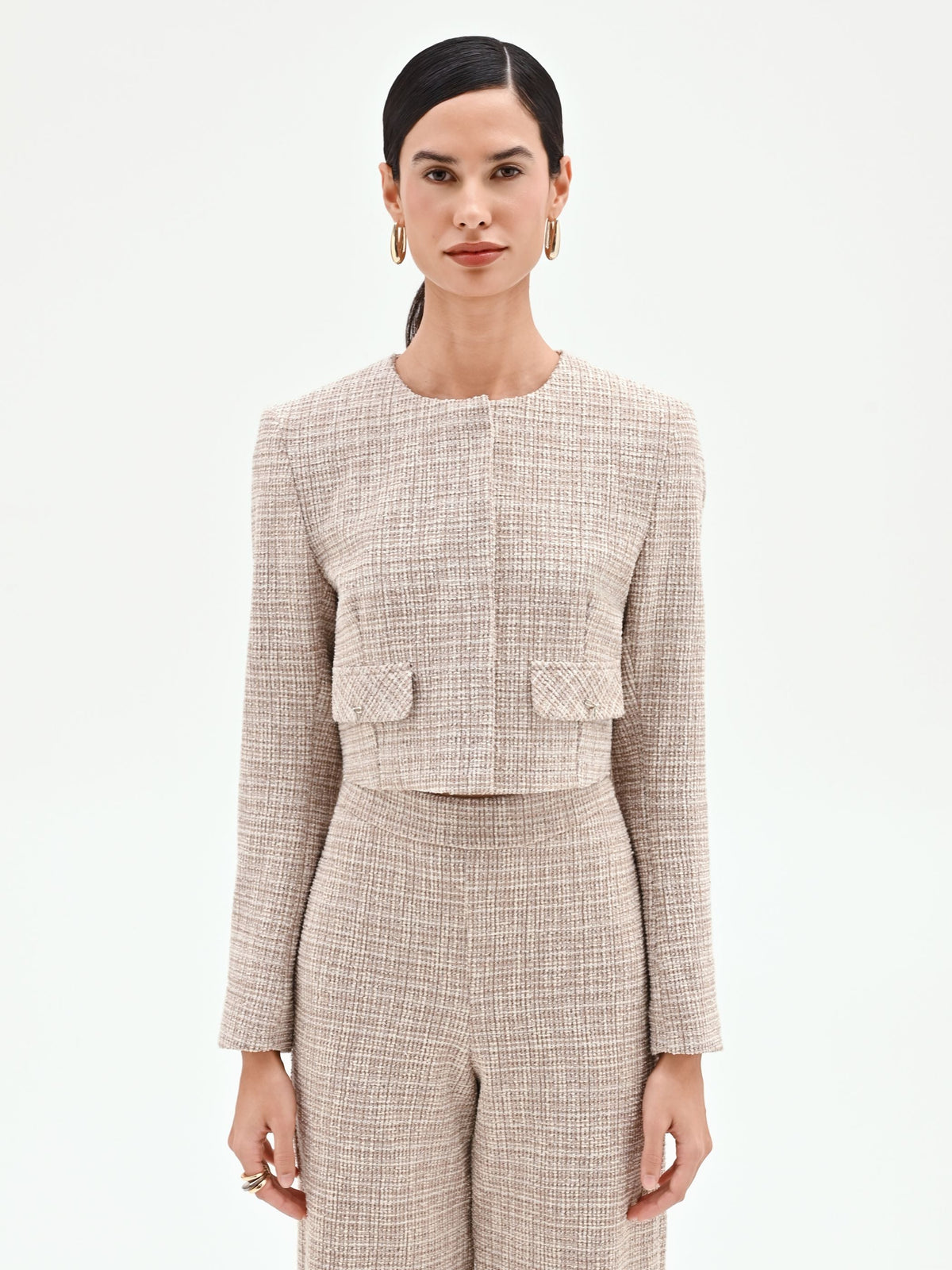 Giacca beige chiaro in tweed con tasche applicate