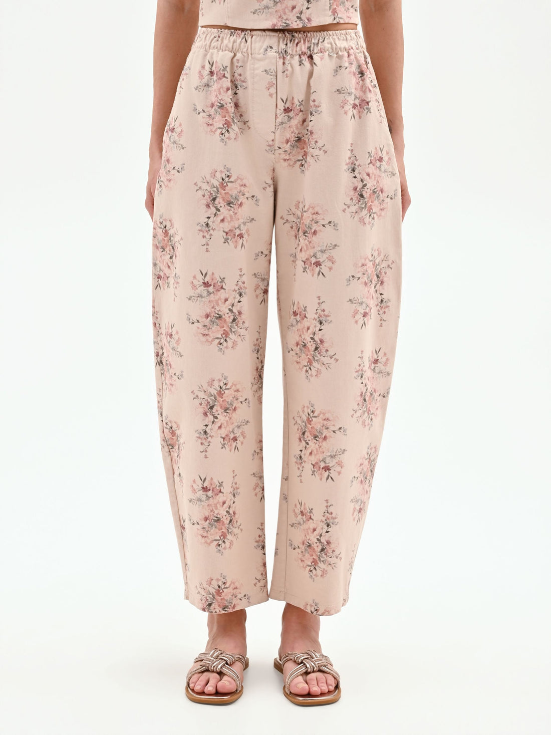 Pantalone rosa in denim stampa floreale
