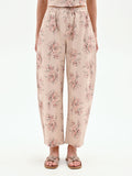 Pantalone rosa in denim stampa floreale