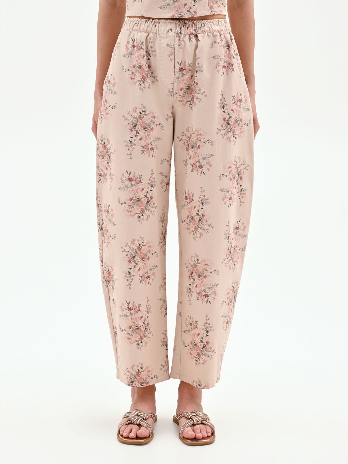 Pantalone rosa in denim stampa floreale
