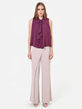 Top smanicato bordeaux con rouche verticale