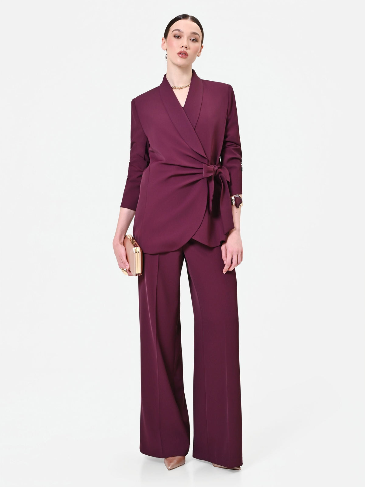 Pantalone a palazzo bordeaux dalla linea fluida