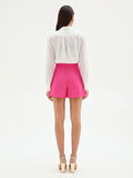 Shorts fuxia a vita alta con bottoni