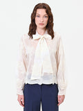 Blusa in pizzo panna con fiocco al collo