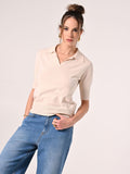 Polo in maglia beige chiaro