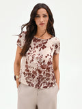 Blusa in raso cioccolato con stampa floreale