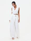 Pantalone palazzo bianco con bottone design