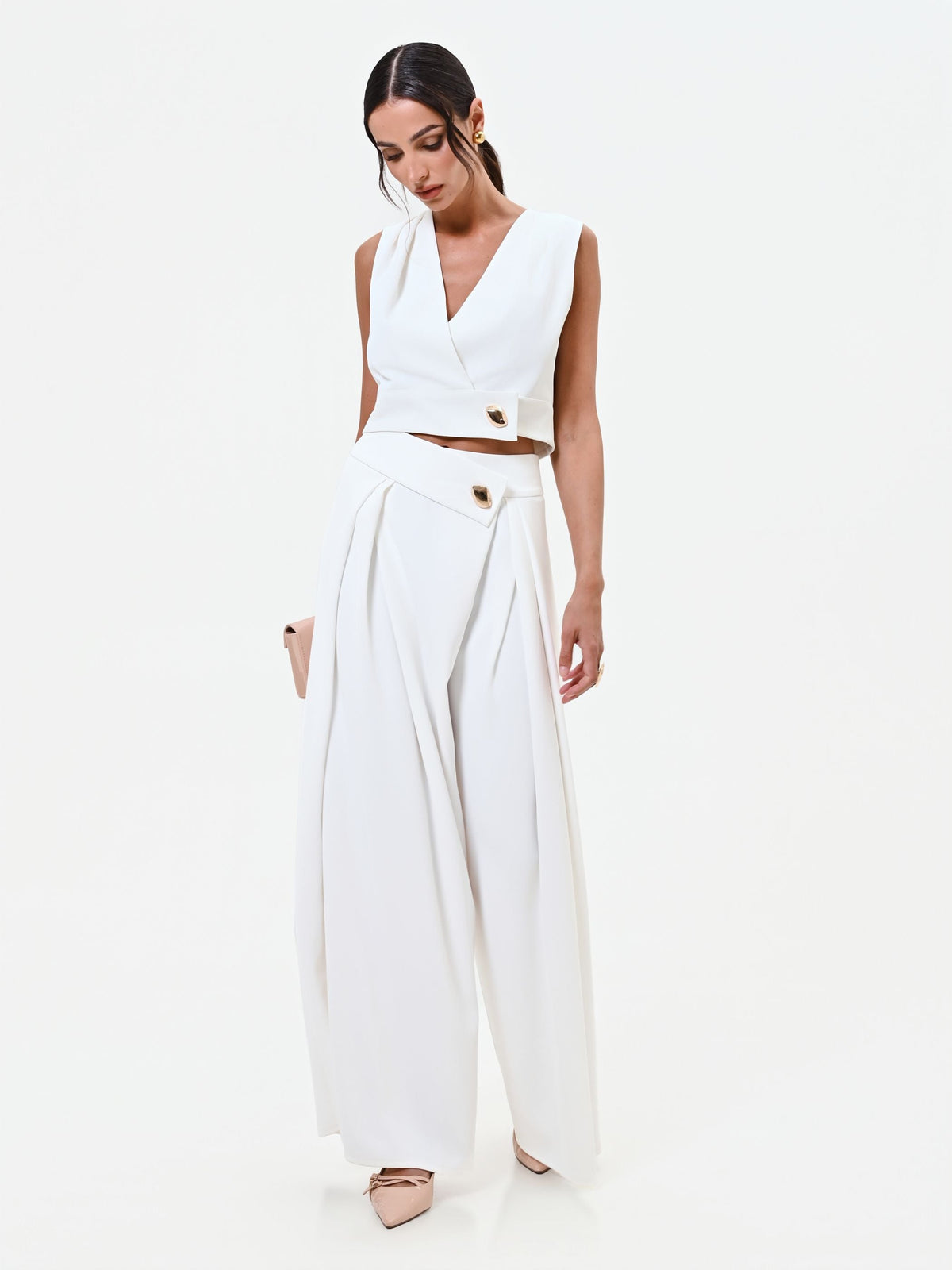 Pantalone palazzo bianco con bottone design