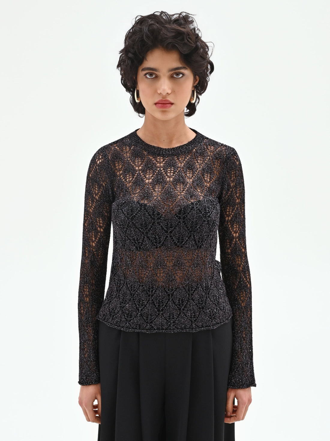 Maglia nera con lavorazione traforata e lurex