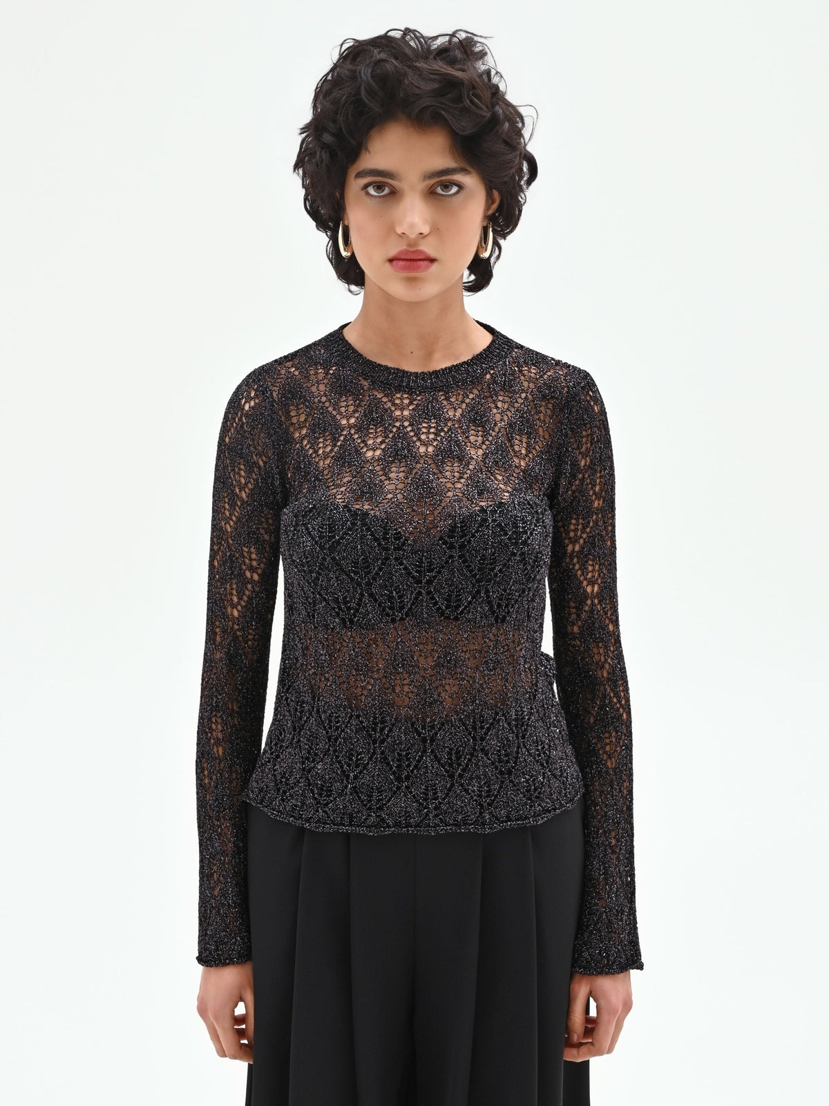 Maglia nera con lavorazione traforata e lurex