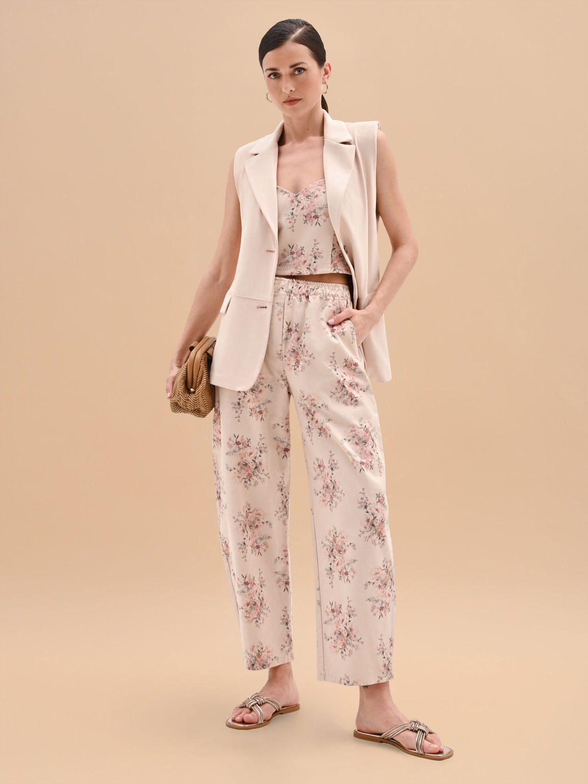Pantalone rosa in denim stampa floreale