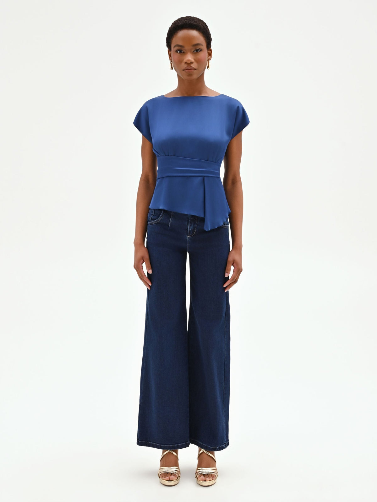 Blusa blu brillante con drappeggio in vita