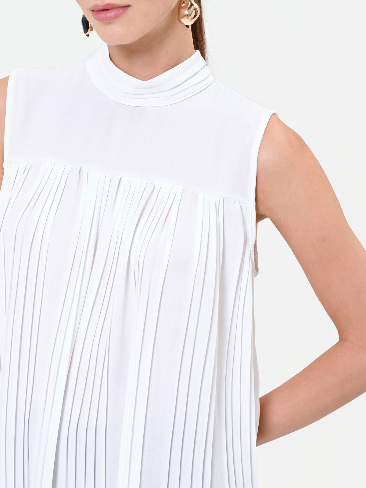 Top smanicato plissé panna bianco