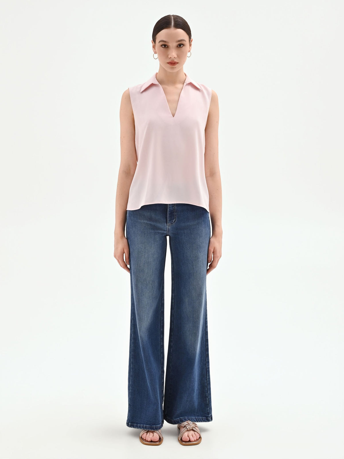 Blusa rosa pastello con collo a rever