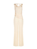 Tuta elegante beige chiaro con corpetto drappeggiato