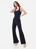 Tuta blu navy con pantalone a zampa