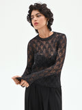 Maglia nera con lavorazione traforata e lurex