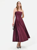 Abito midi bordeaux in raso con gonna ampia