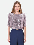 Blusa rosa antico in paillettes con disegno a rombi