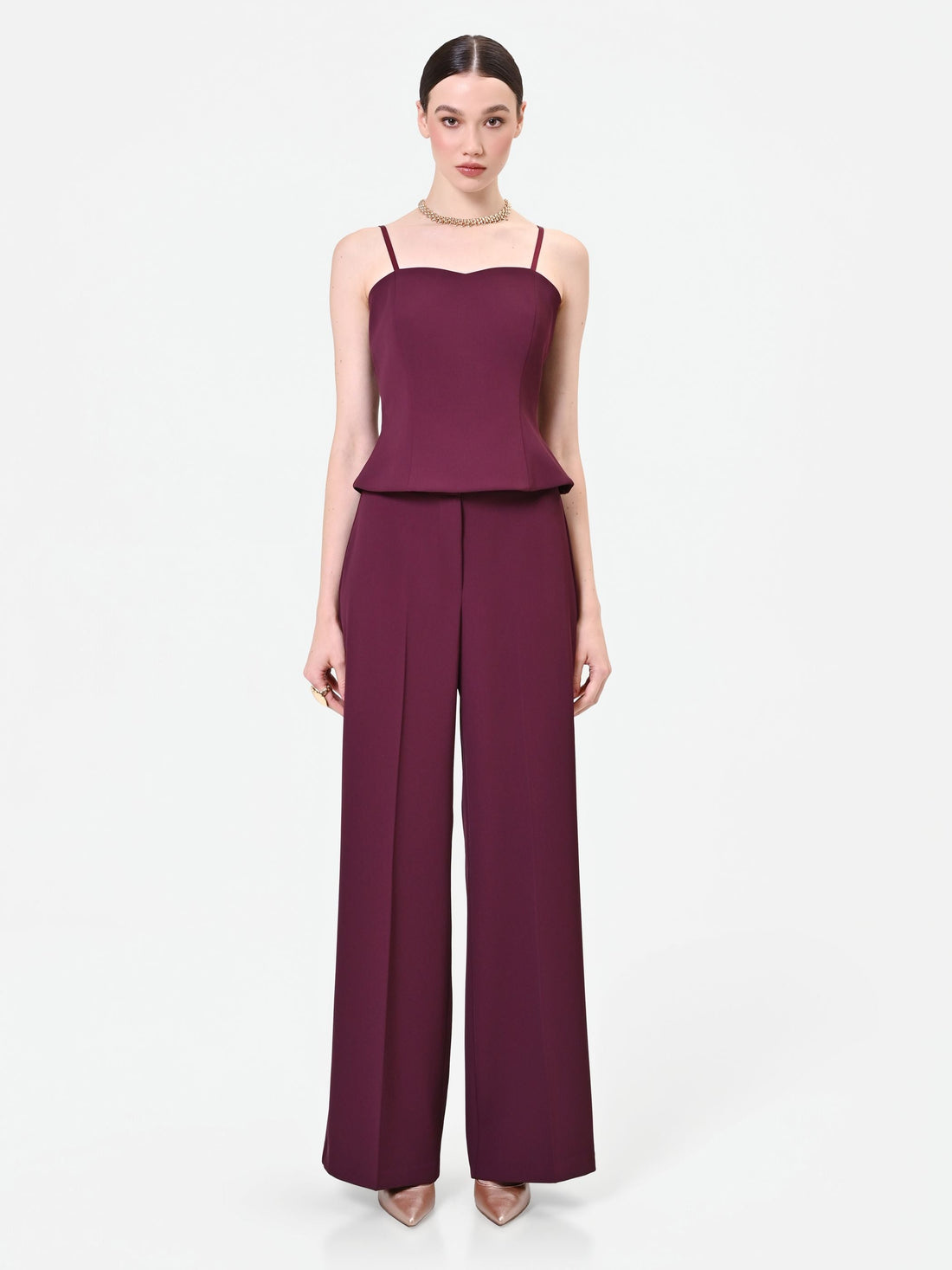 Pantalone a palazzo bordeaux dalla linea fluida