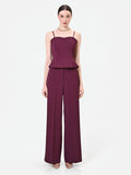 Pantalone a palazzo bordeaux dalla linea fluida