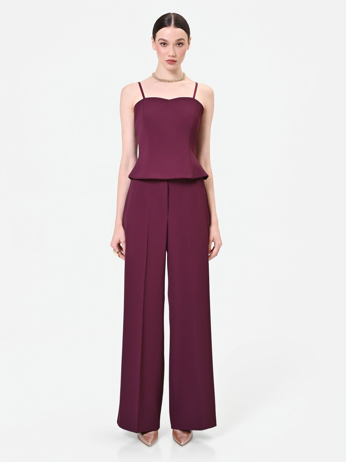 Pantalone a palazzo bordeaux dalla linea fluida