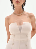 Tuta palazzo beige chiaro con bottoni e bustier