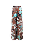 Pantalone a palazzo cioccolato con stampa botanica