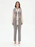 Blusa azzurra check con gilet e collo lavallière