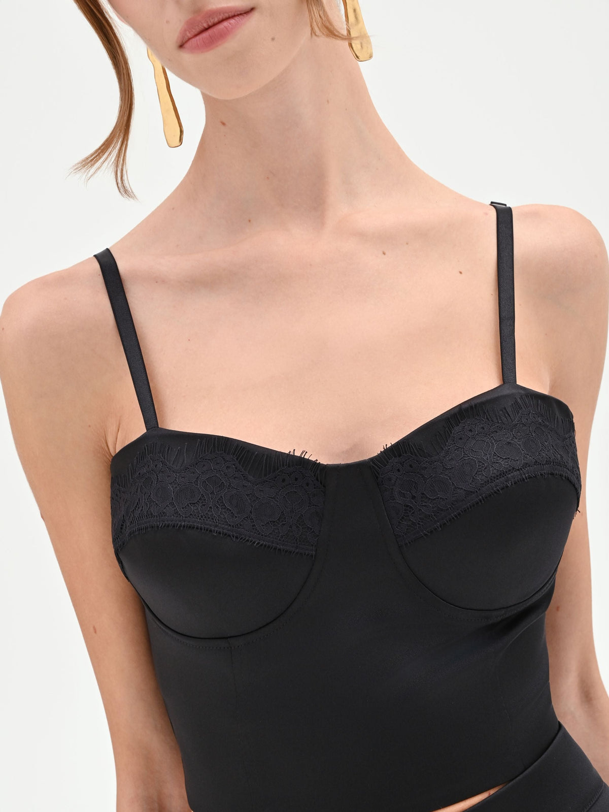 Top bustier nero con profili in pizzo